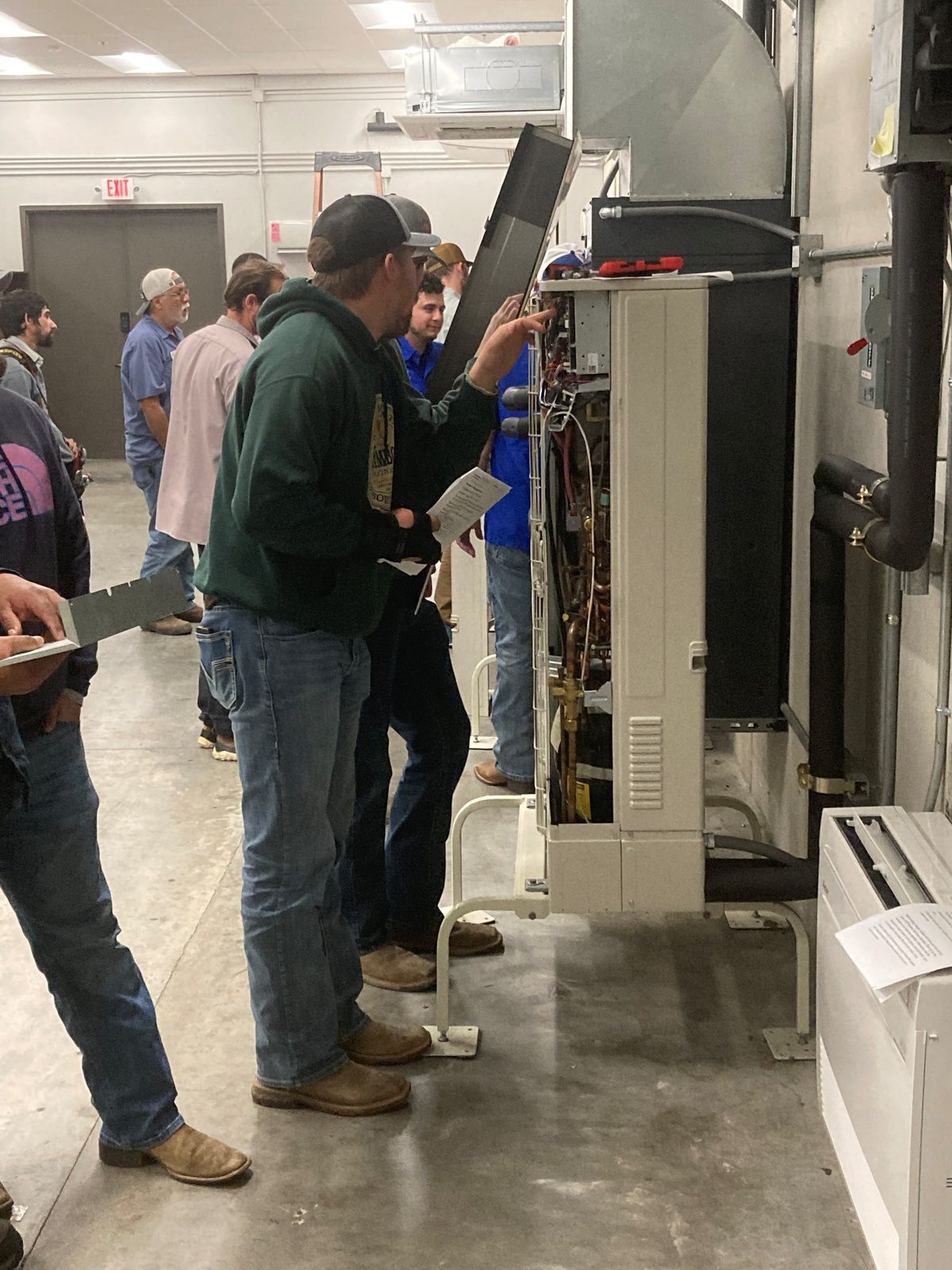 leons-blinn-training Leon's technicians training on HVAC equipment