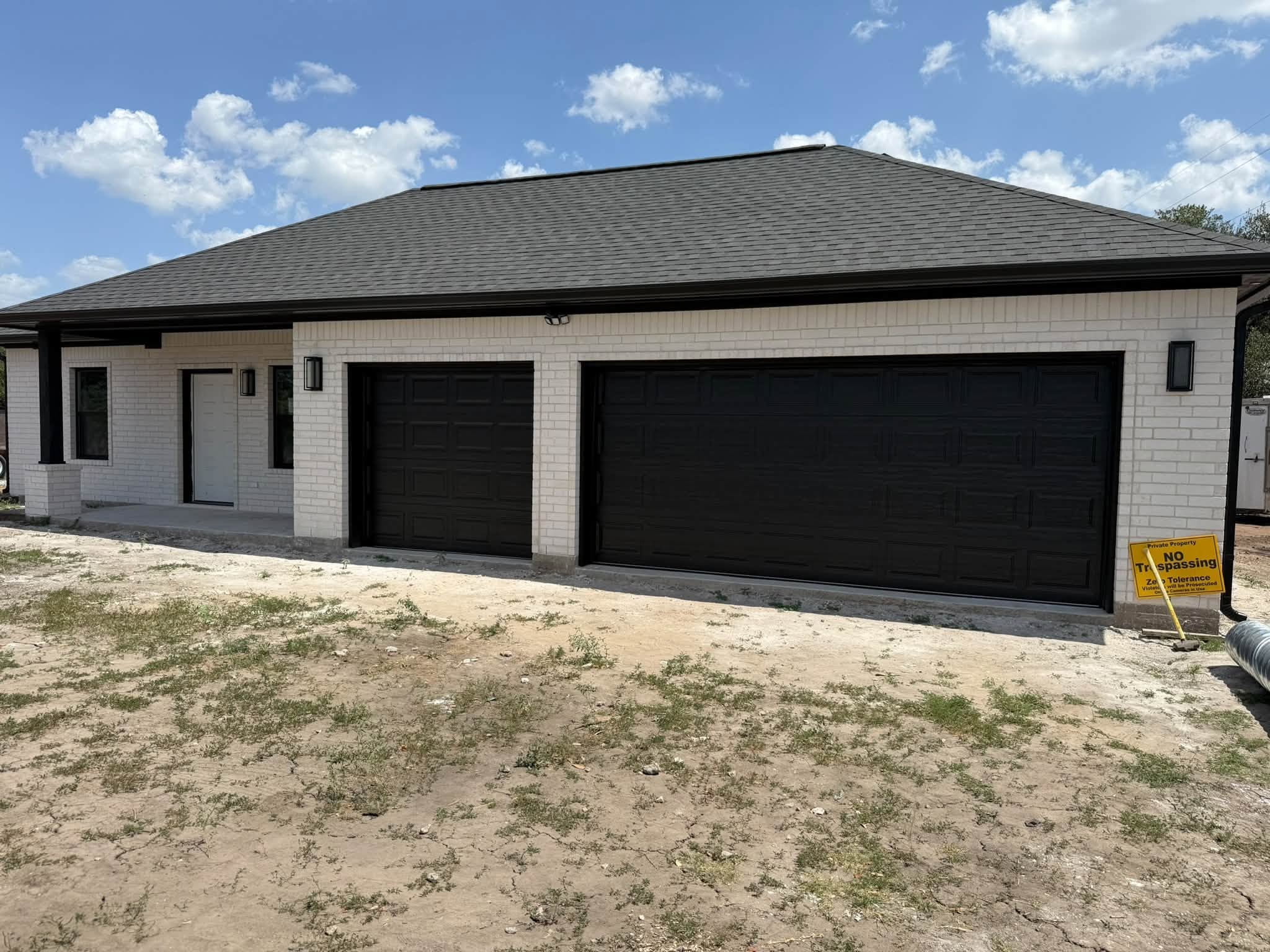 Fresh double garage door install on a home in the La Grange area